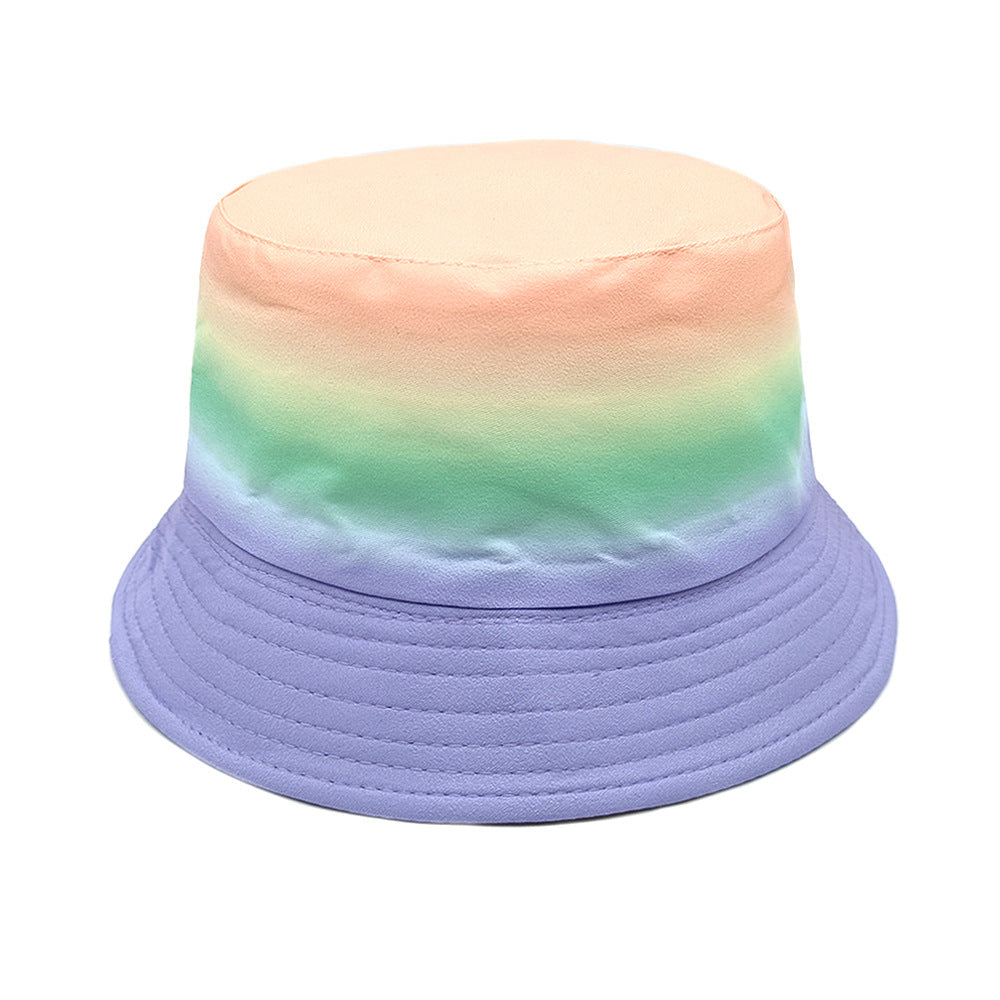 Kids bucket hat with pastel rainbow gradient in pink, mint, and lavender, wide brim