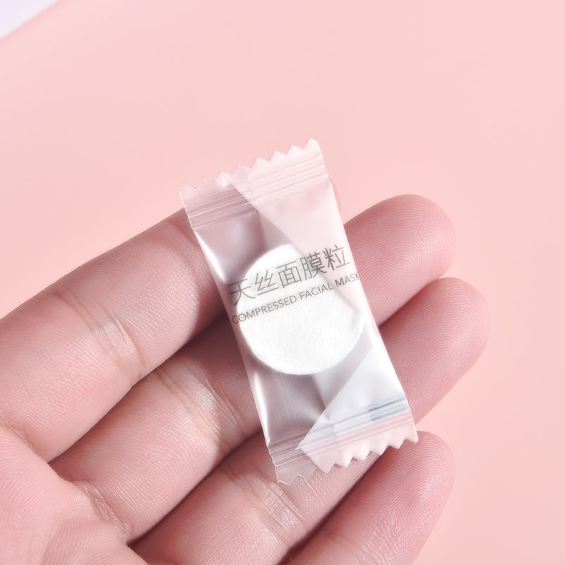 Compressed lyocell facial mask sheets in candy bag packaging showing 35 individual tablets for DIY skincare masks
